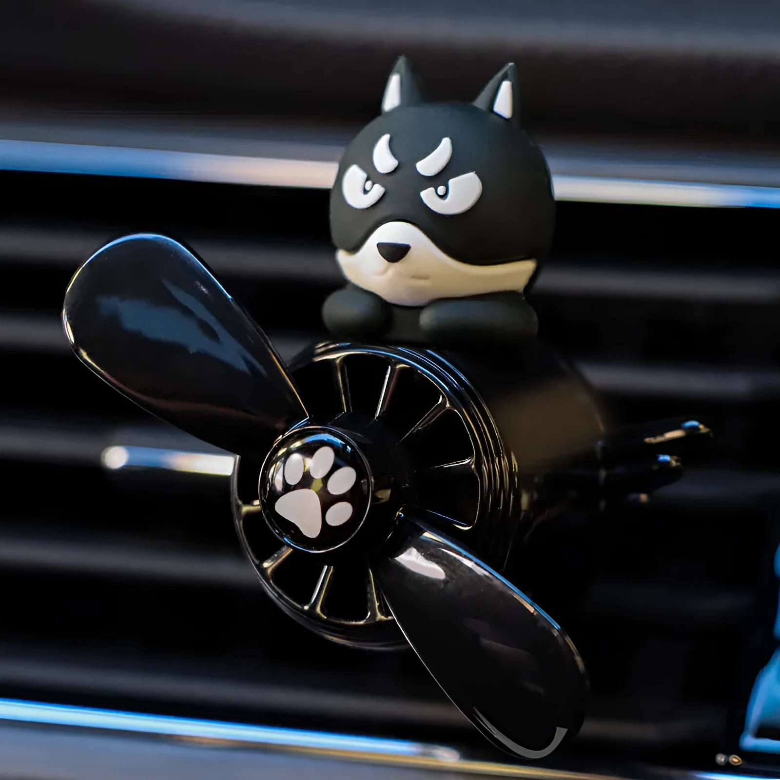 Set of four car air vent ornament designs: black husky, black cat, pink cat, and pink duck on cloth bags.