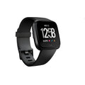 Black smart watch with heart rate monitoring on silicone wristband showing 1.4-inch screen
