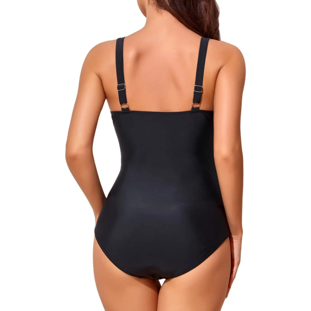 Women's black deep V cross pleated backless one-piece swimsuit on a mannequin.