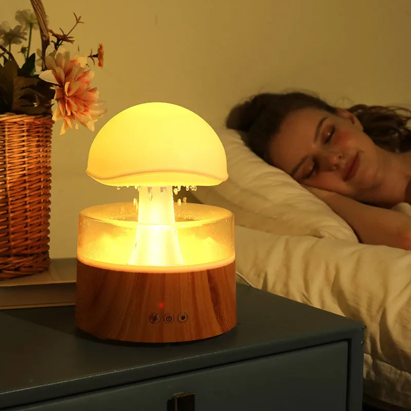 White cloud-shaped ultrasonic humidifier with rainfall mist effect and multi-colour LED lighting