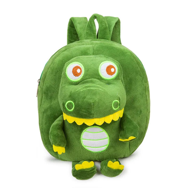 Soft blue plush children's backpack with an embroidered dinosaur character and a soft handle.