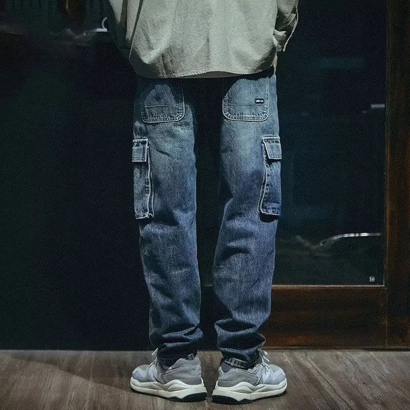 Men's loose straight blue denim trousers with stretch fabric and zip fly in retro style