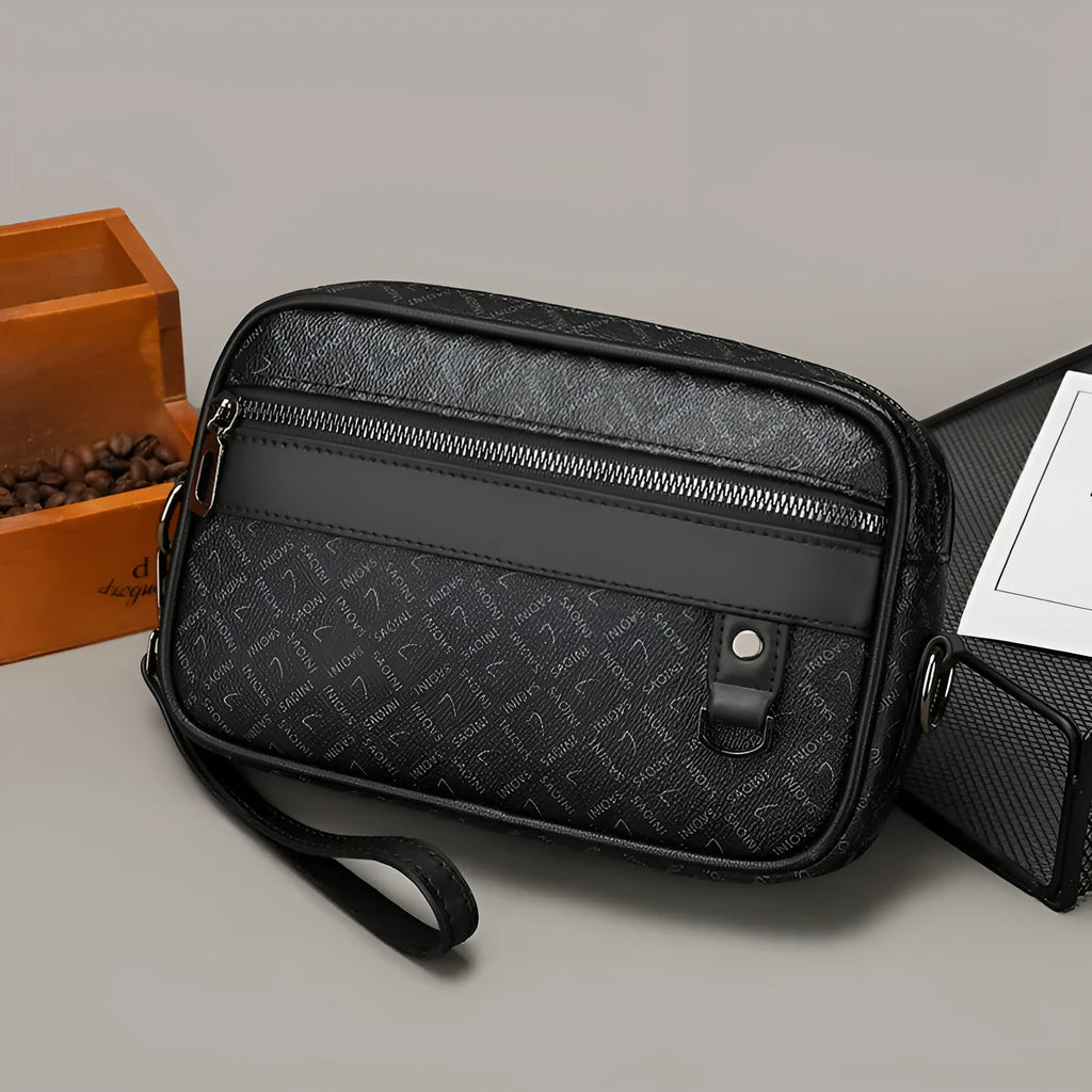 Men's black PU leather messenger bag with geometric pattern lining and shoulder strap
