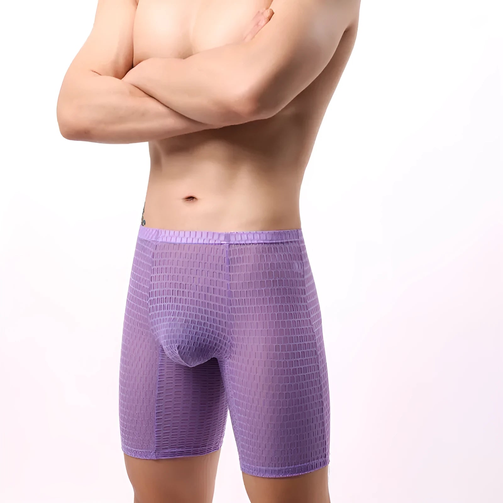 Men's white lace lengthened boxer shorts on a flat surface, showing mid-waist and knitted fabric detail.