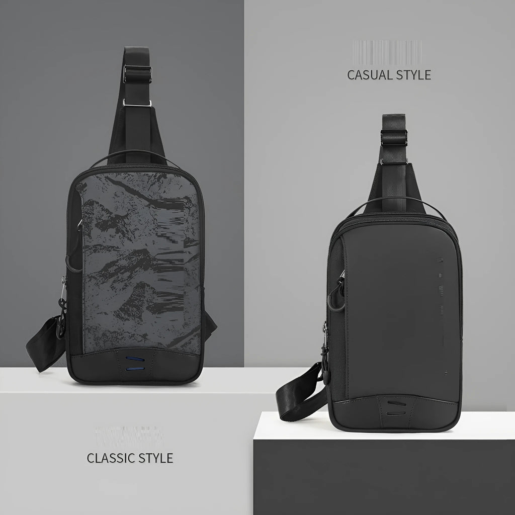 Casual black TPU camouflage chest bag with a single shoulder strap and soft handle, showing a square vertical shape and outer sandwich pocket.