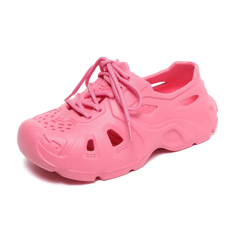 Pair of bright green EVA sandals with a thick, moulded sole and simple strap design.