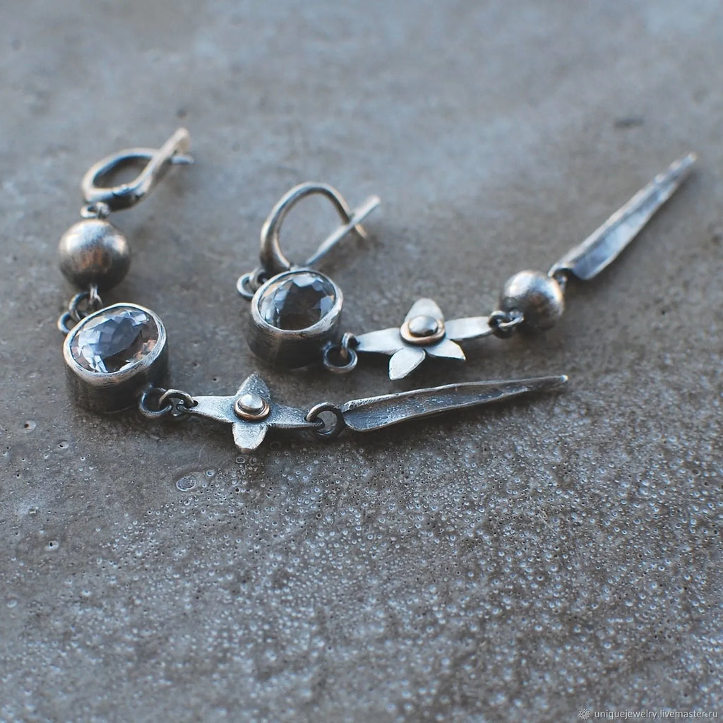 Geometric antique silver XINGX pendant earrings with long rhinestone detailing