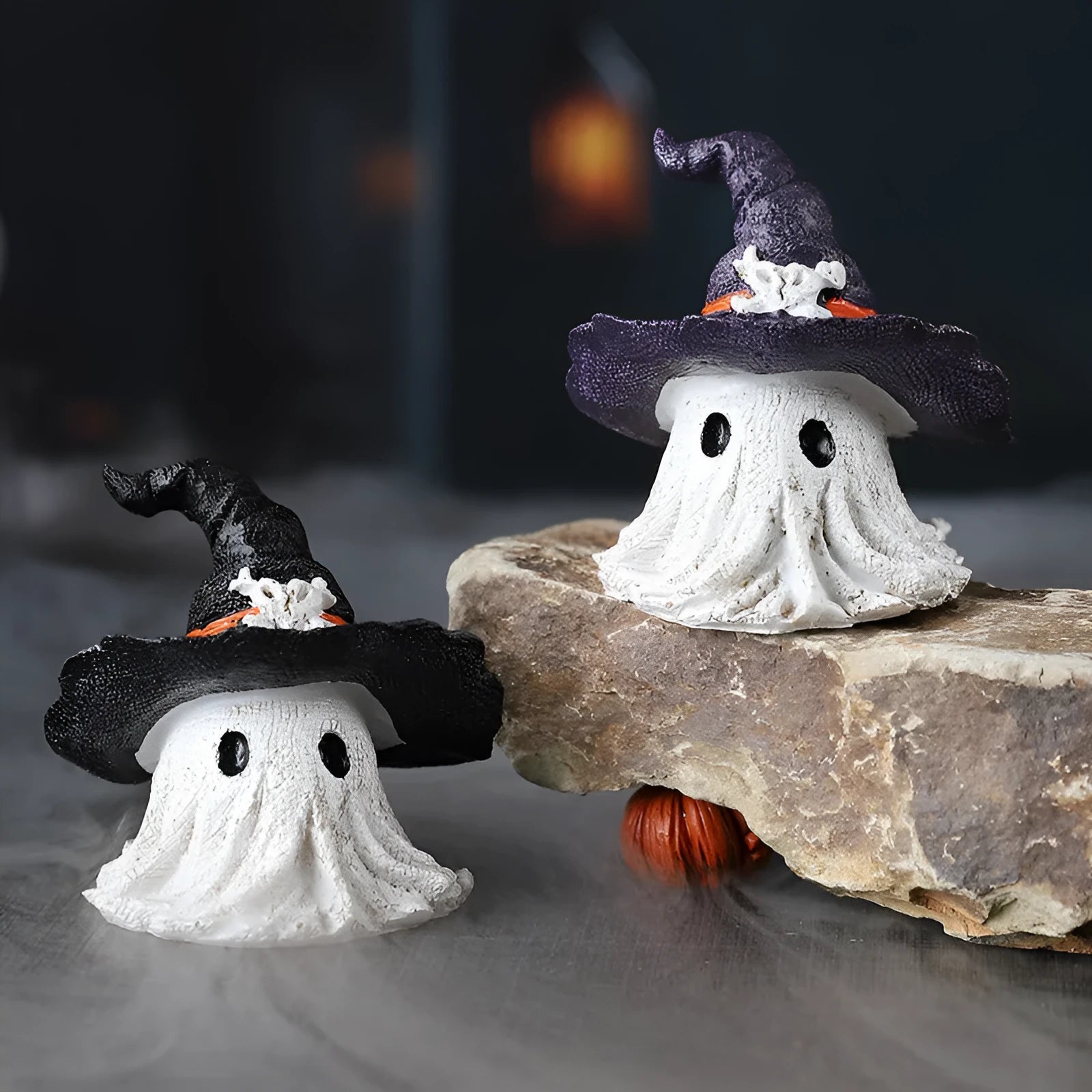 Handmade resin wizard hat ornament in black and purple for Halloween and Christmas decoration.
