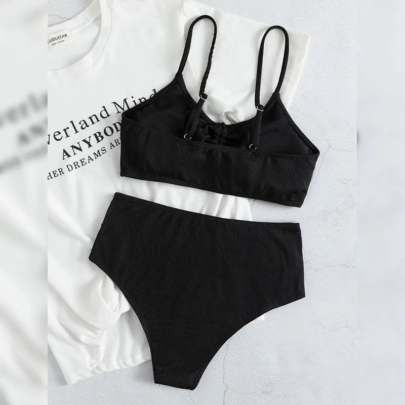 Black women's high waist sling split bikini swimsuit with sleeveless top and shorts