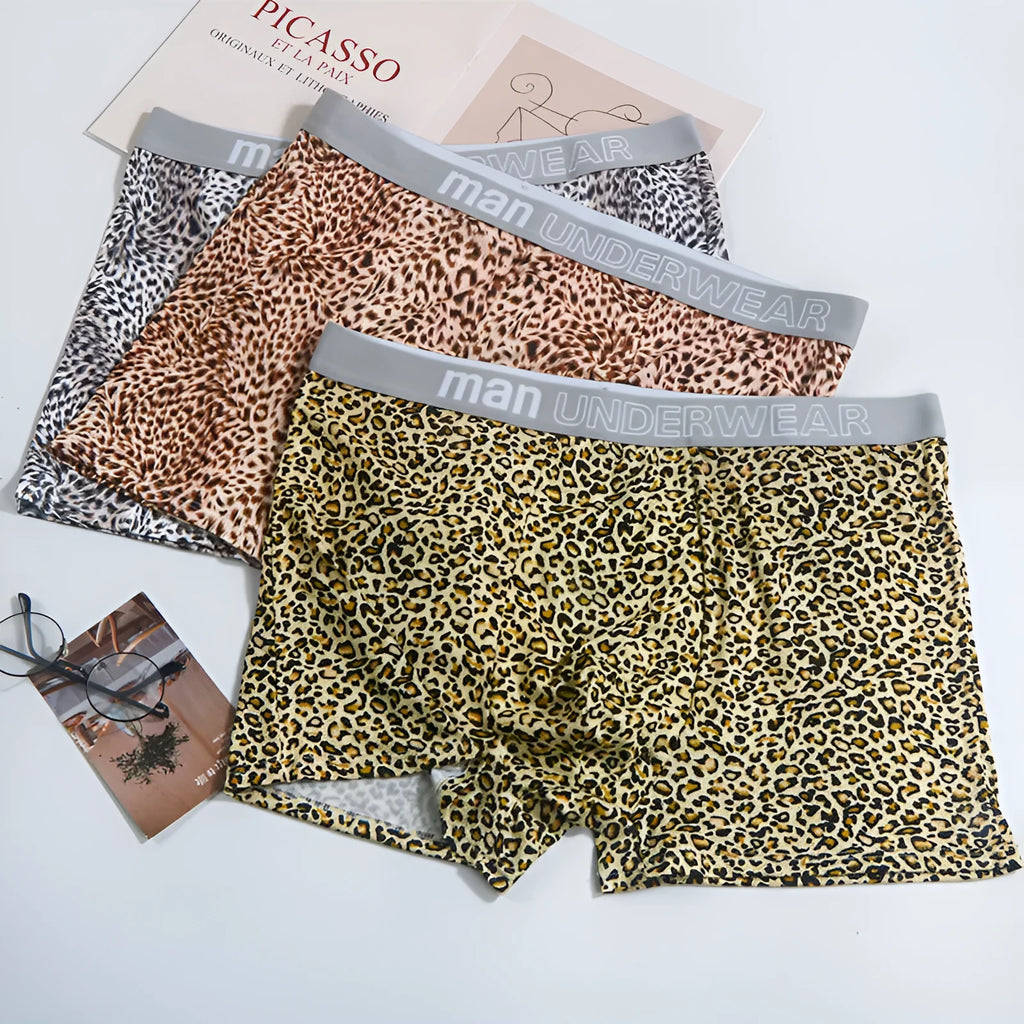 Men's loose fit leopard print underwear in grey and yellow colours on a white background