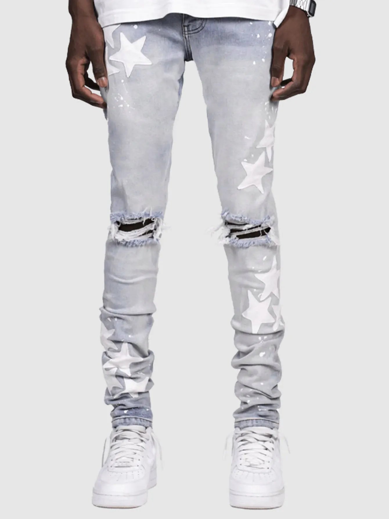 Men's slim stretch blue jeans with embroidery detail on denim fabric.