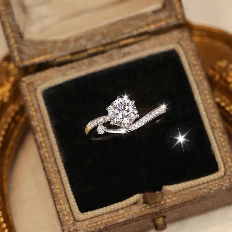 S925 sterling silver starry track ring with 1-karat oval plum blossom cut moissanite stone on white background