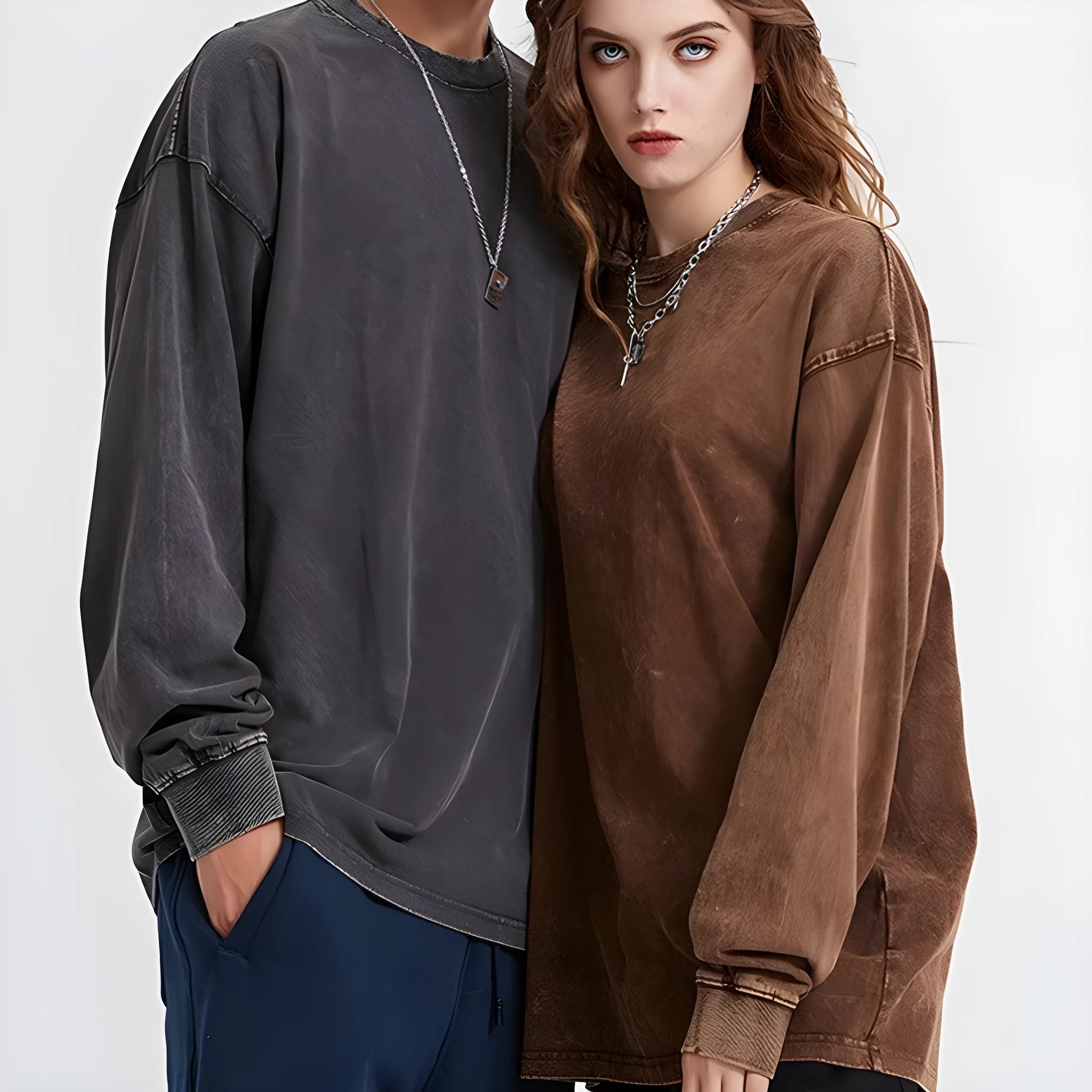 Man wearing a loose fit vintage washed cotton long sleeve pullover in a batik colour.