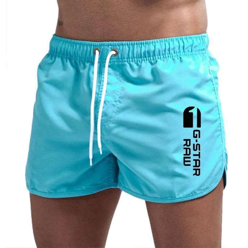 Men's polyester beach shorts with elastic waistband in multiple colour options