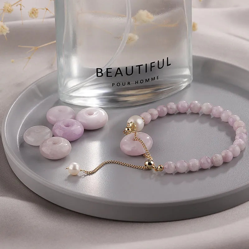 Women's Korean style crystal bracelet with choice of jade pendant, strawberry quartz, or spodumene purple styles and various buckle types.