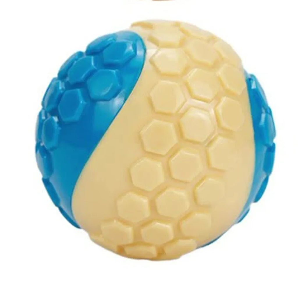 TPR plaid molar dog toy ball in blue, pink, green, and grey colours with textured surface