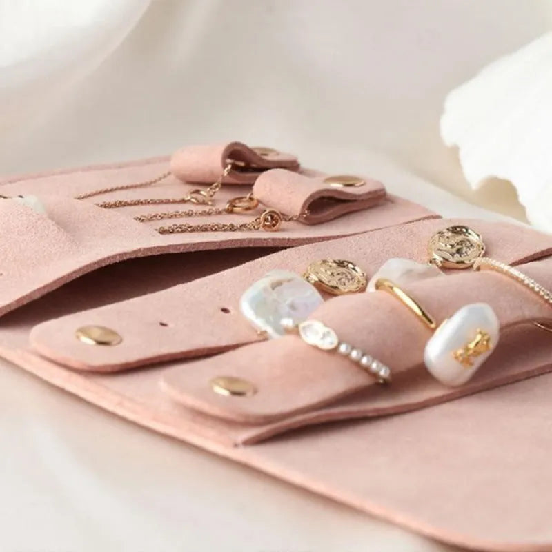 Brown PU leather and microfiber jewellery storage bag for earrings, rings and watches.