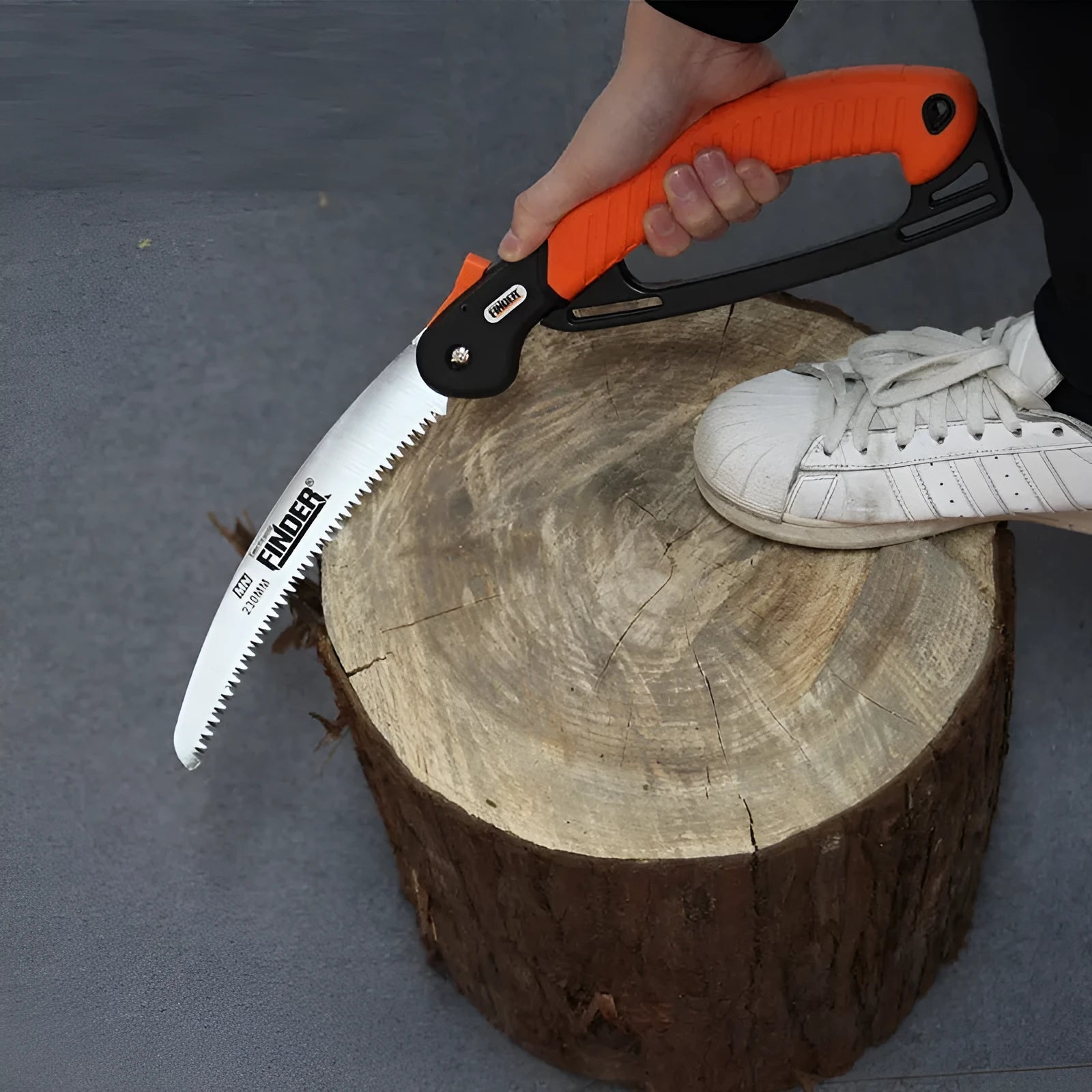 A folded and unfolded view of a 230mm folding garden saw with a TPR grip and steel blade.