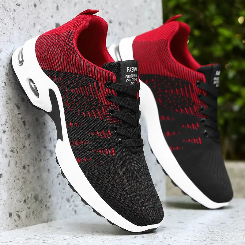 Men's black and grey Flyknit mesh sneakers with soft sole and lace-up design