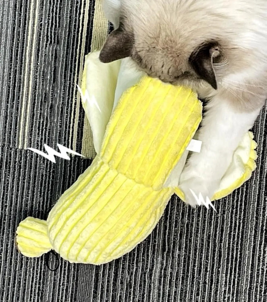 Yellow banana-shaped plush cat toy with a green tip and a textured velvet strip.