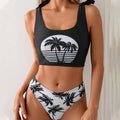 Women's coconut print bikini swimsuit with lace-up detail on a hanger