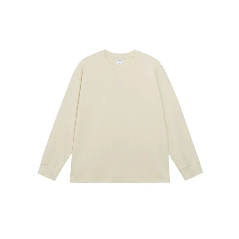 Men's solid colour pure cotton long-sleeved t-shirt shown in loose fit on a hanger.