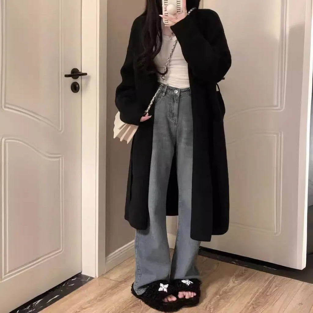 Women's khaki knitted V-neck cardigan with long sleeves, shown on a hanger.