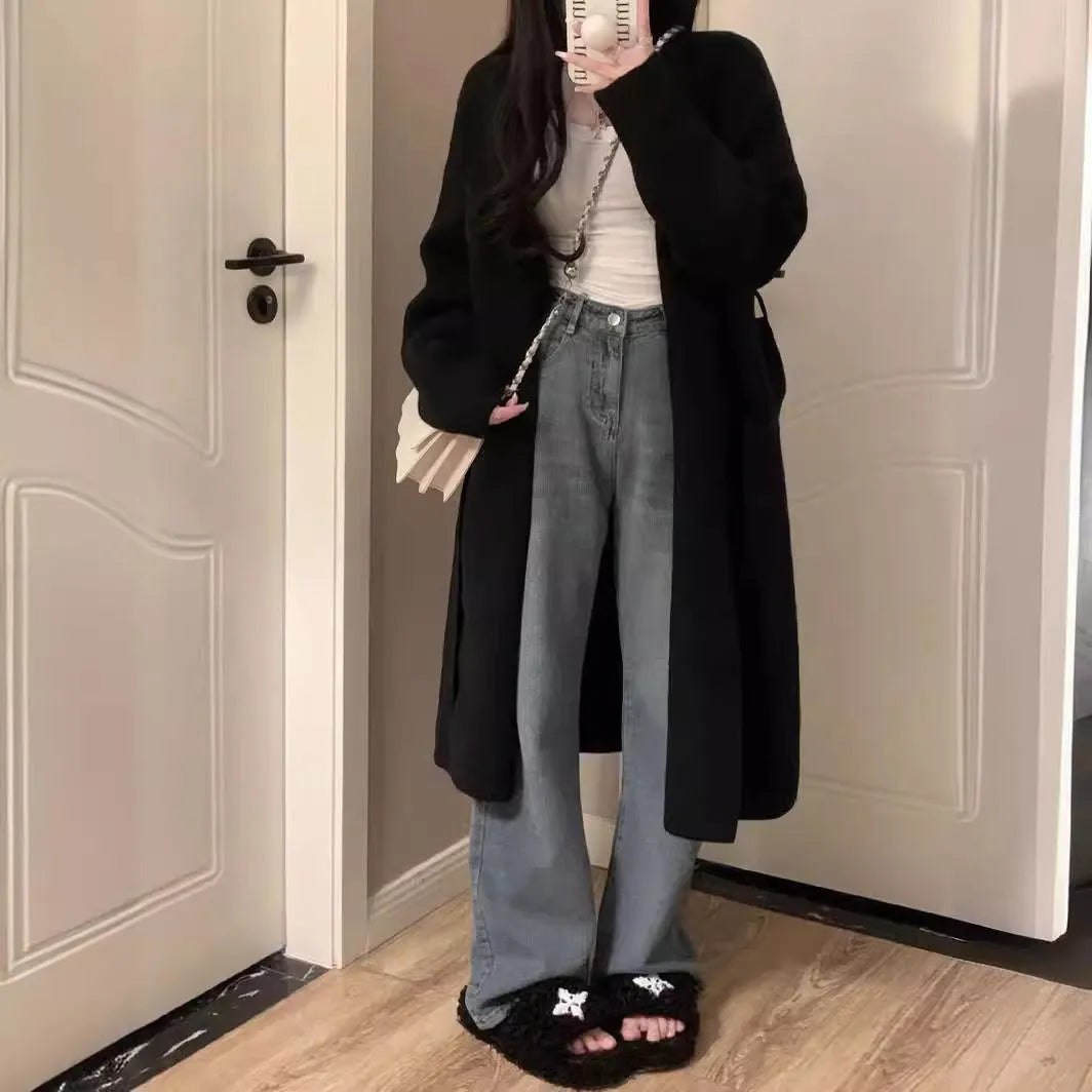 Women's khaki knitted V-neck cardigan with long sleeves, shown on a hanger.