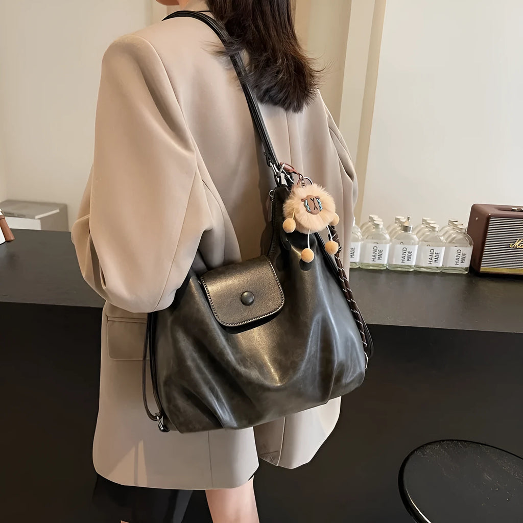 Textured PU leather women's shoulder bag with horizontal square shape and single strap in commuter backpack design