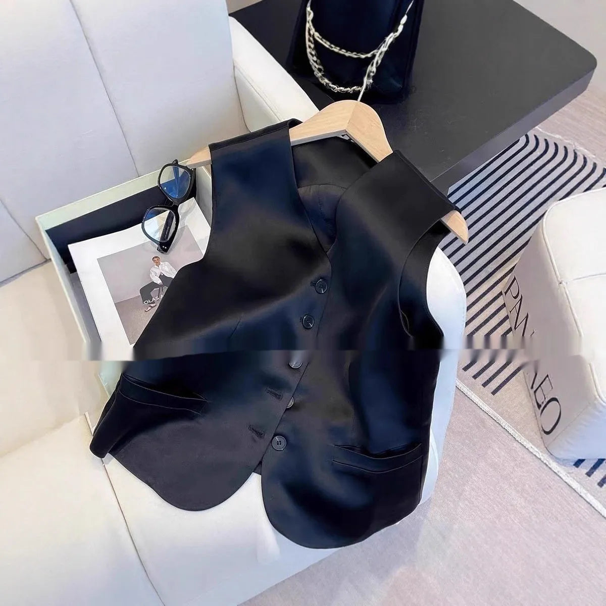 Black satin ladies sleeveless vest with splicing detailing and loose fit