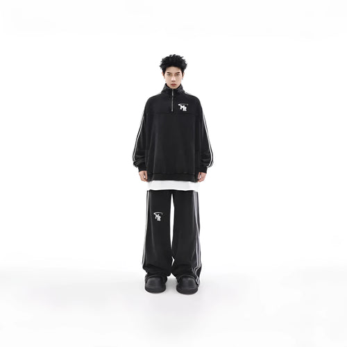 Black retro stand collar polyester hoodie coat for men and women on a hanger.