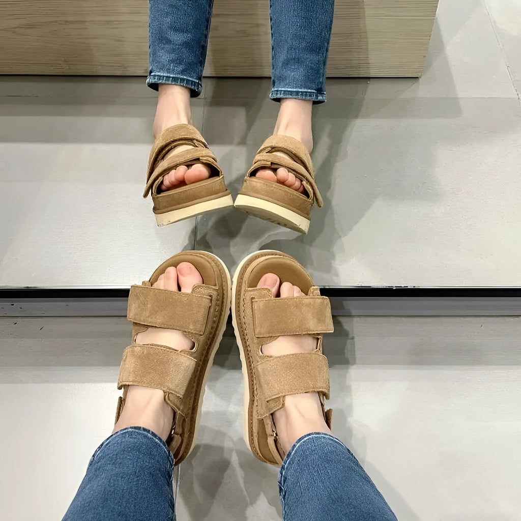 Women's maroon suede peep toe platform sandals with Velcro strap, shown from side view.