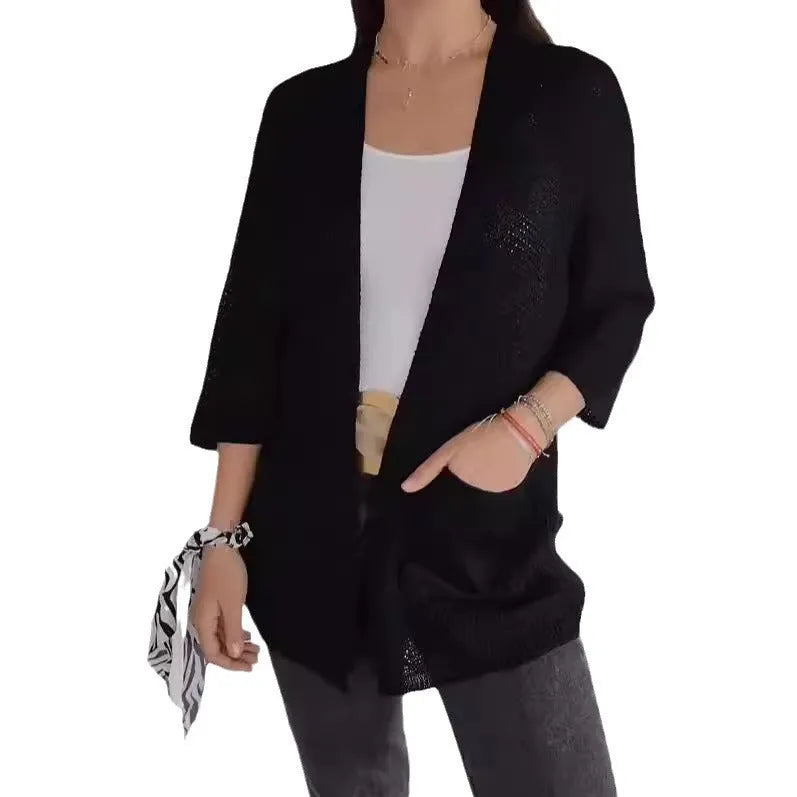 Women's waffle texture cardigan coat with nine-quarter sleeves shown in army green colour.