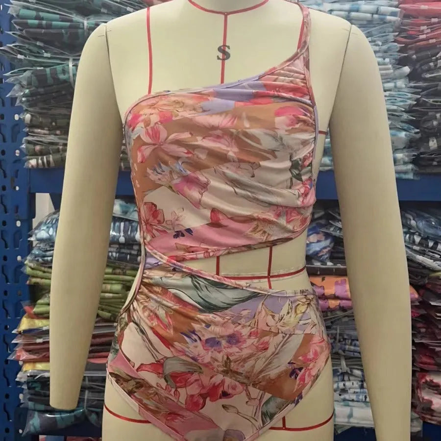 Rose gold patterned women's swimsuit in polyester fabric on mannequin