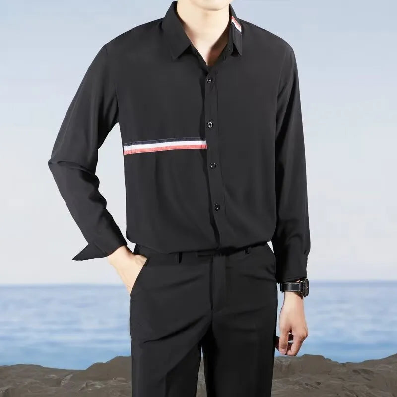 Hong Kong style loose fit cotton blend shirt in light blue, showing cardigan design on a hanger.