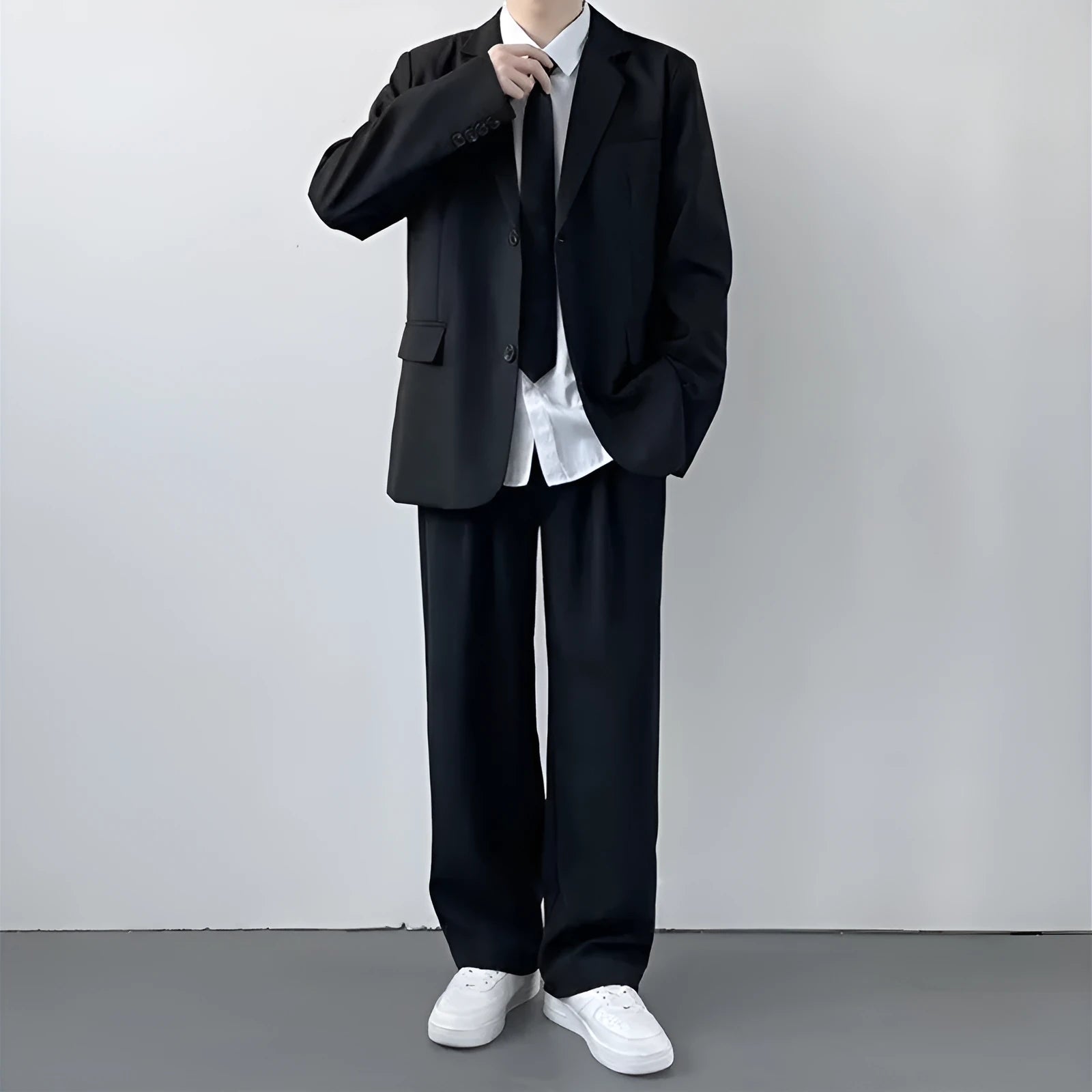 Plus size men's college style suit jacket and trousers ensemble with white shirt and tie