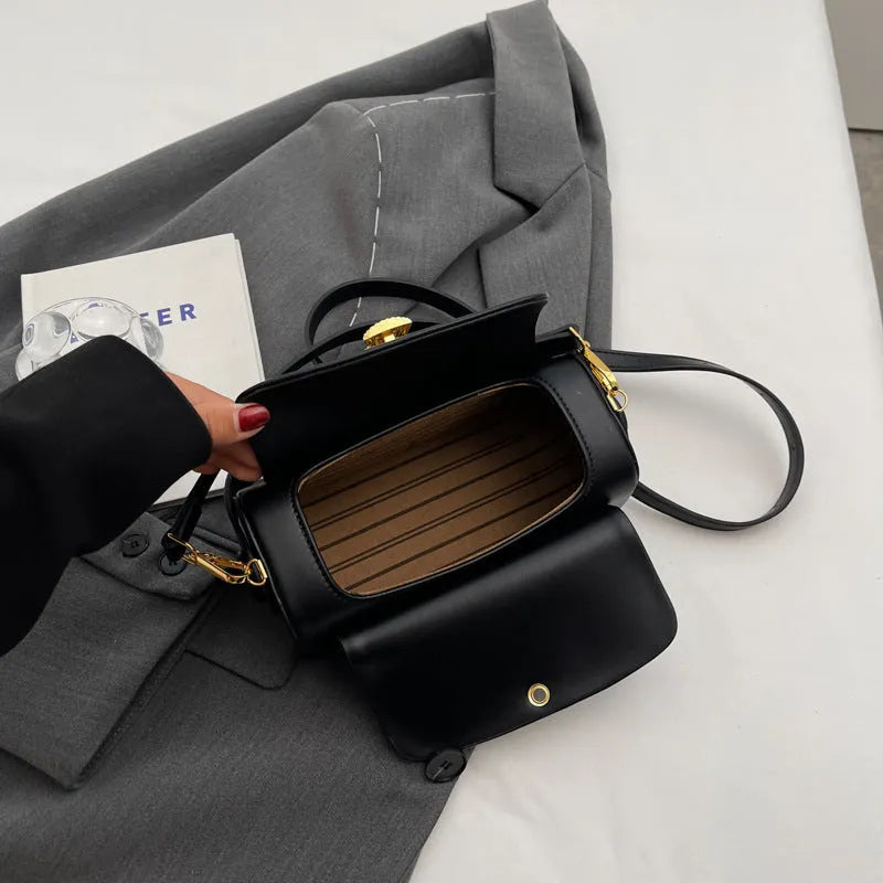 A personalised women's shoulder messenger bag in PU leather, shown in beige with letter detailing.