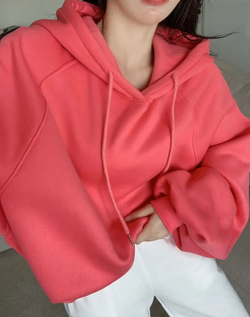 Watermelon red mulberry silk women's hooded sweater in loose pullover style.
