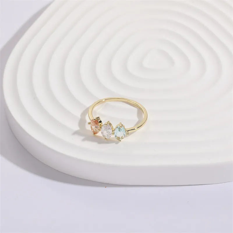 Geometric triangle birthstone ring with horse eye tricolor zircon stone in 14k gold plating
