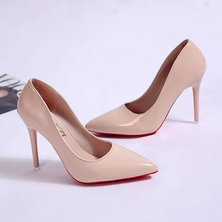 Solid colour women's pointed toe pumps with a stiletto heel on a rubber sole.