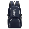 Dark blue folding outdoor backpack with straps, showing its large capacity and air pillow belt.