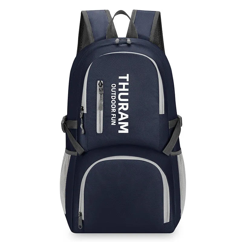 Dark blue folding outdoor backpack with straps, showing its large capacity and air pillow belt.