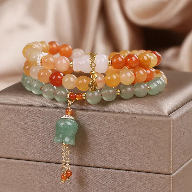 Multi-layer Jinsi Jade beaded bracelet with three circles and lily motif, ethnic style women's jewellery