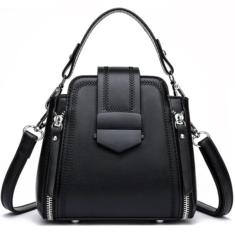 Soft textured PU leather small square handbag for women in multiple colour options showing sewing thread detail.