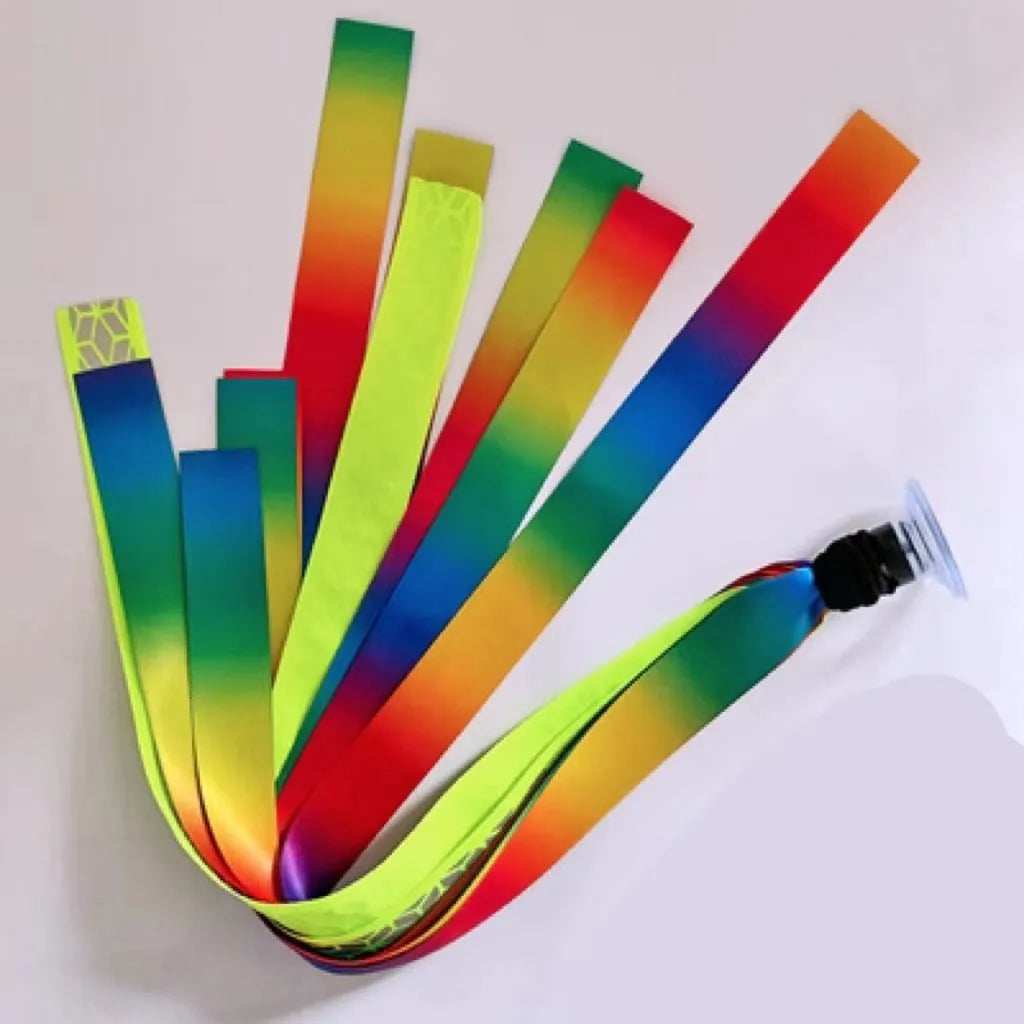 A decorative ribbon streamer for attaching to a child's roller skate or ski helmet, shown in a selection of colours.