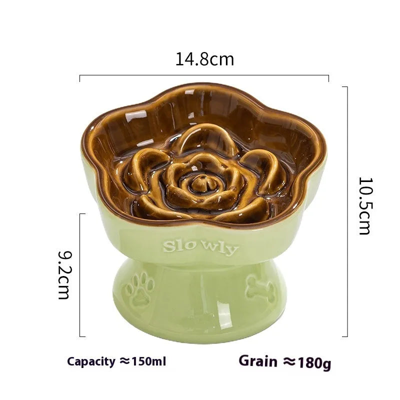 White ceramic pet bowl with a high foot base and wide, shallow eating area for dogs and cats