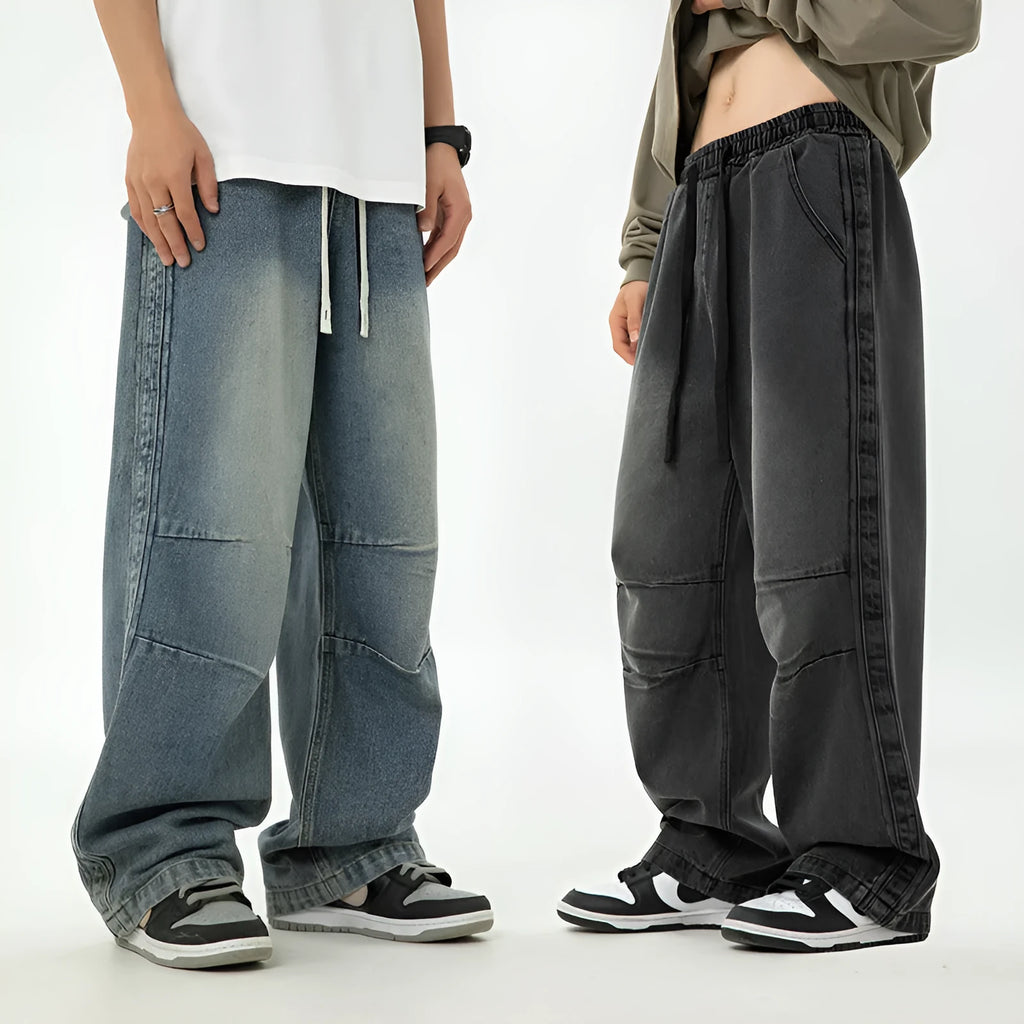 Men's pleated Japanese drawstring trousers in black, loose fit, mid-rise waist, cotton blend fabric, front view