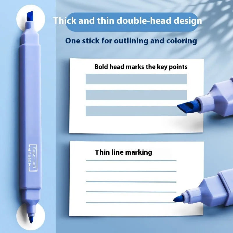 Set of double-headed fluorescent marking pens in bright colours on a white background.