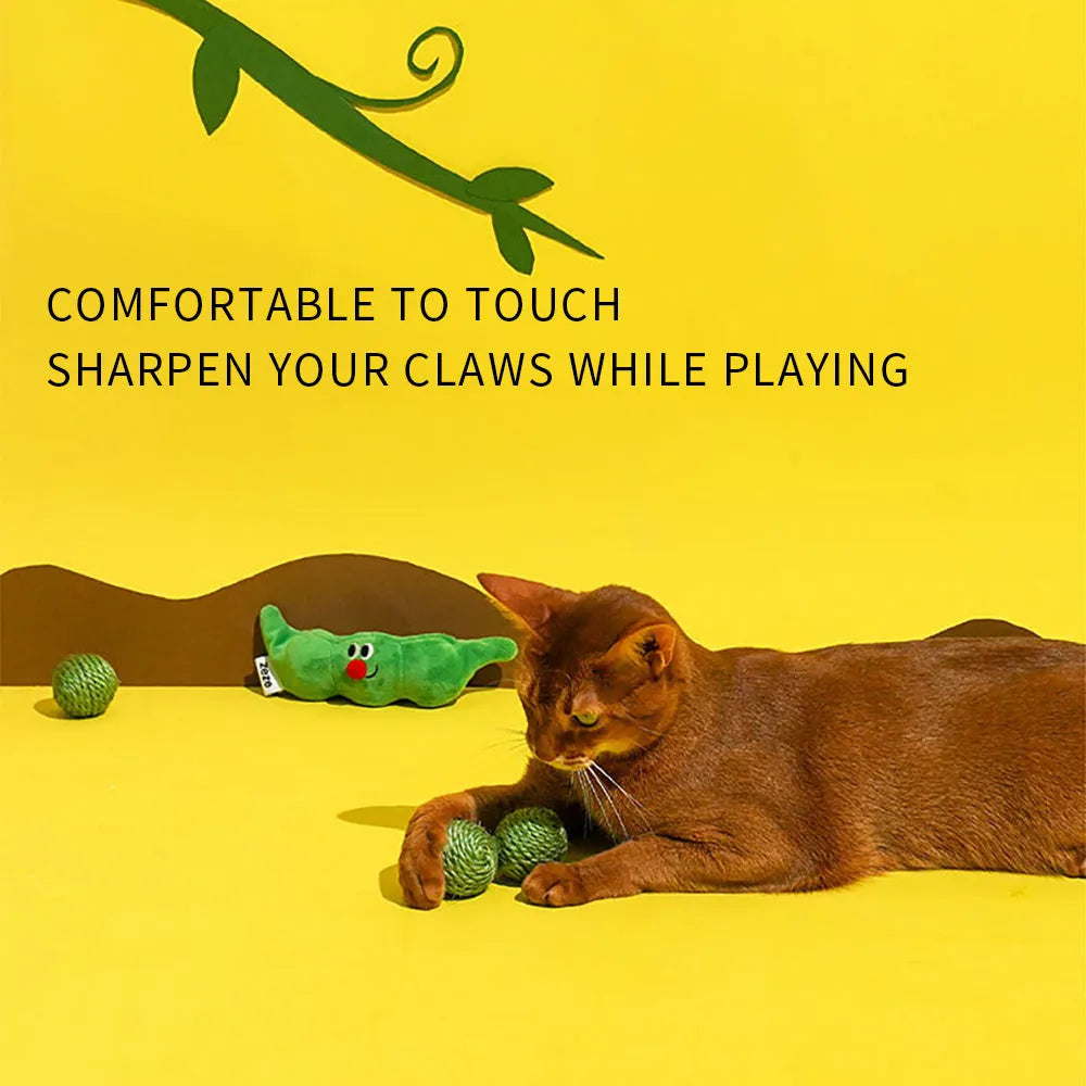 Three green sisal rope cat toy balls with rustling soundstone next to pea pod storage bag