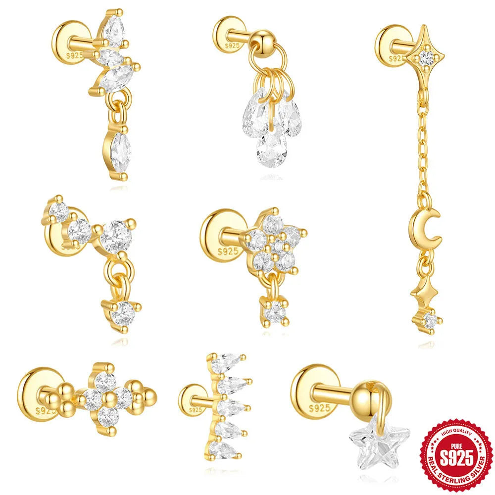 S925 sterling silver geometric star-shaped earrings with a moon and diamond detail in a gold tone.